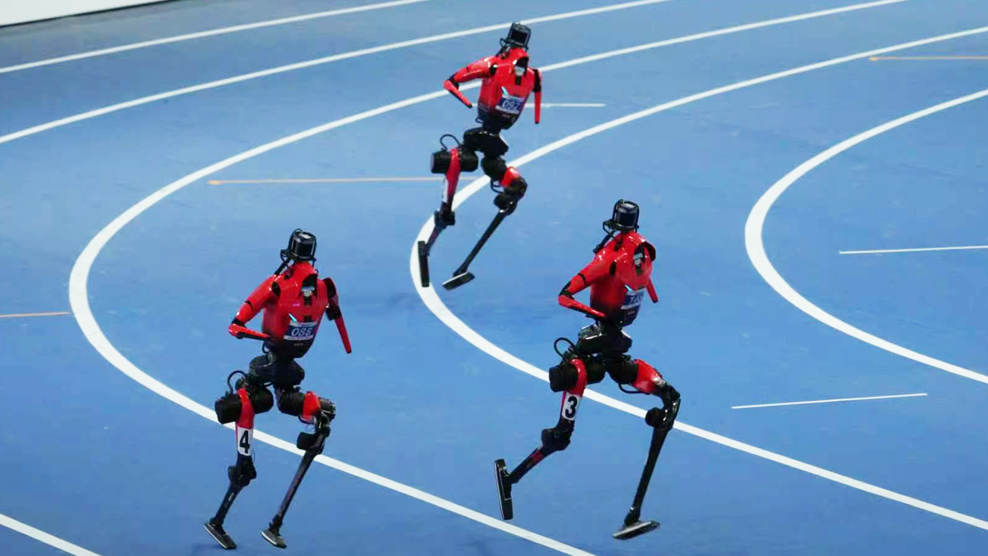 Running competition at the second World Humanoid Robot Games.  / Photo by Qu Bo