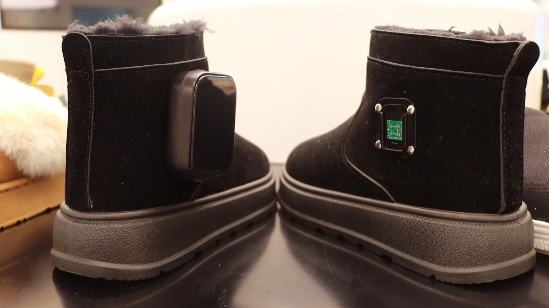 Local companies have rolled out upgraded traditional snow boots with built-in heating devices. /CMG