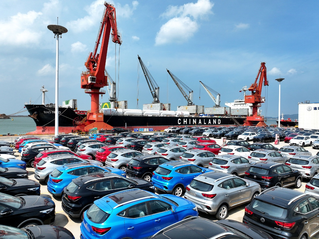 Chinese-made new energy vehicles are lined up at Lianyungang port for export, Jiangsu Province, China, July 9, 2026. /VCG