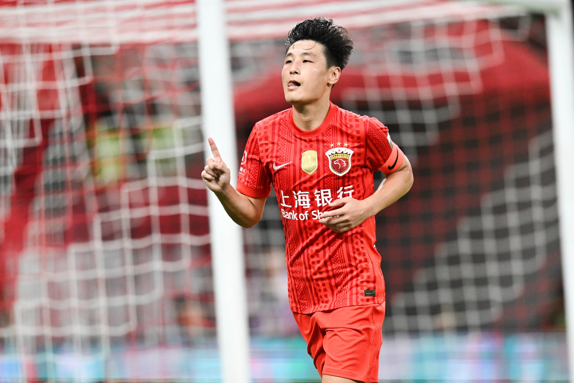 Shanghai Port's Wu Lei celebrates after scoring a goal in the Chinese Super League match against Qingdao Hainiu in east China's Shanghai Municipality, August 23, 2026. /IC Photo 