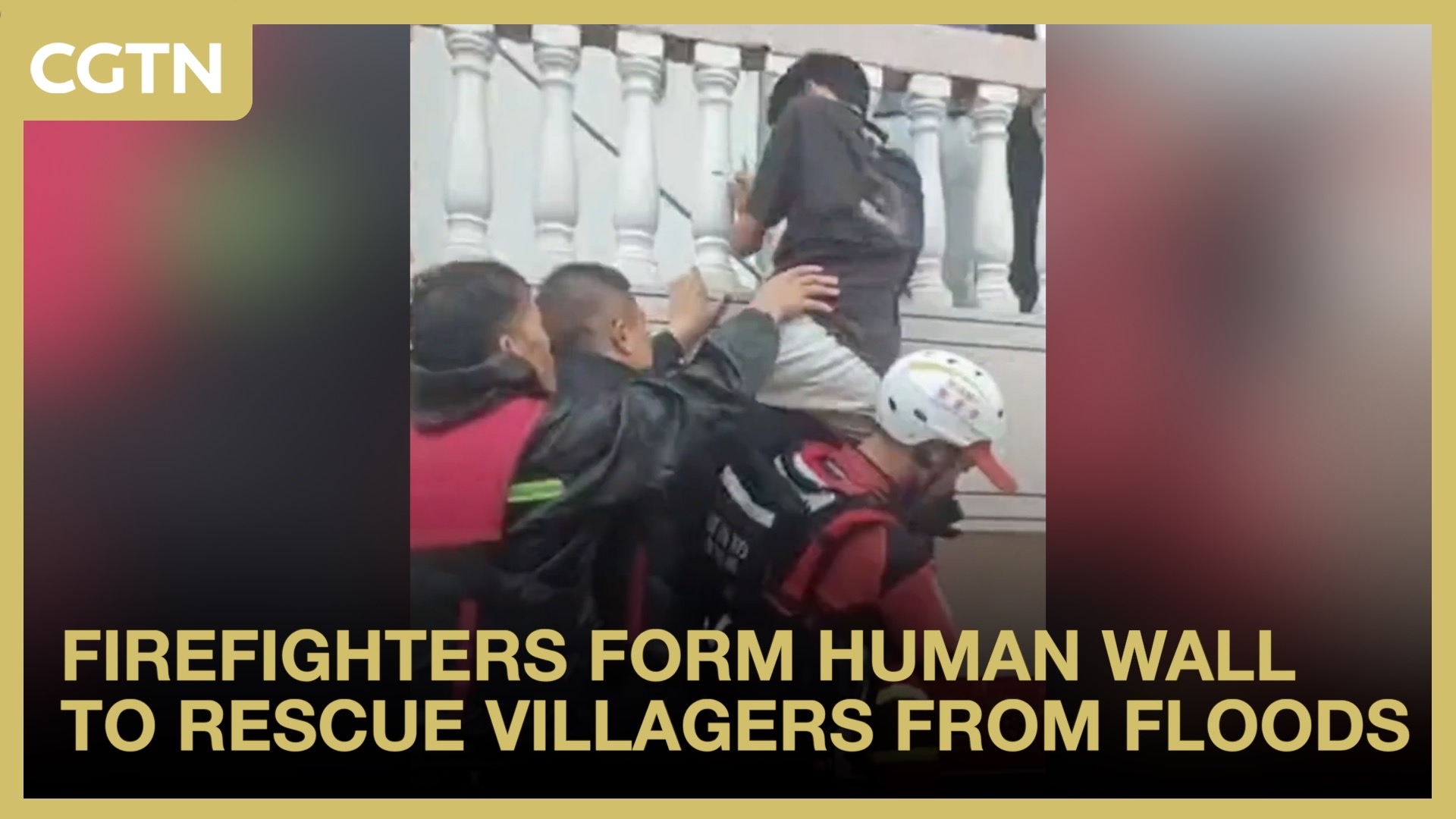 Firefighters form human wall to rescue villagers from floods