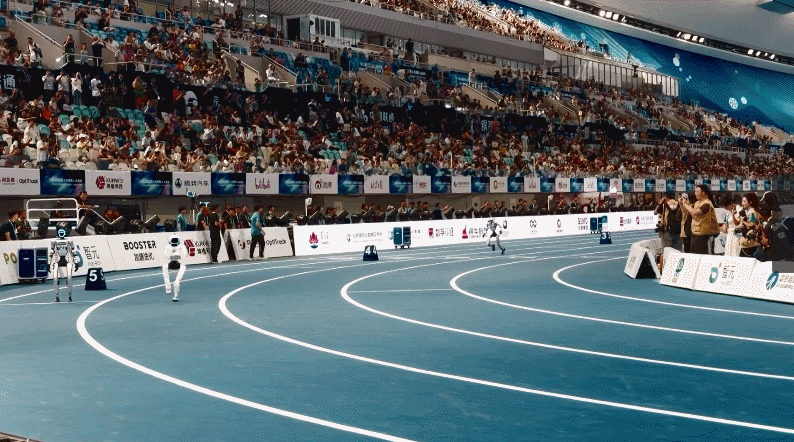 Humanoid robots race during a speed competition at the second World Humanoid Robot Games, Beijing, China, August 23, 2026. /CMG