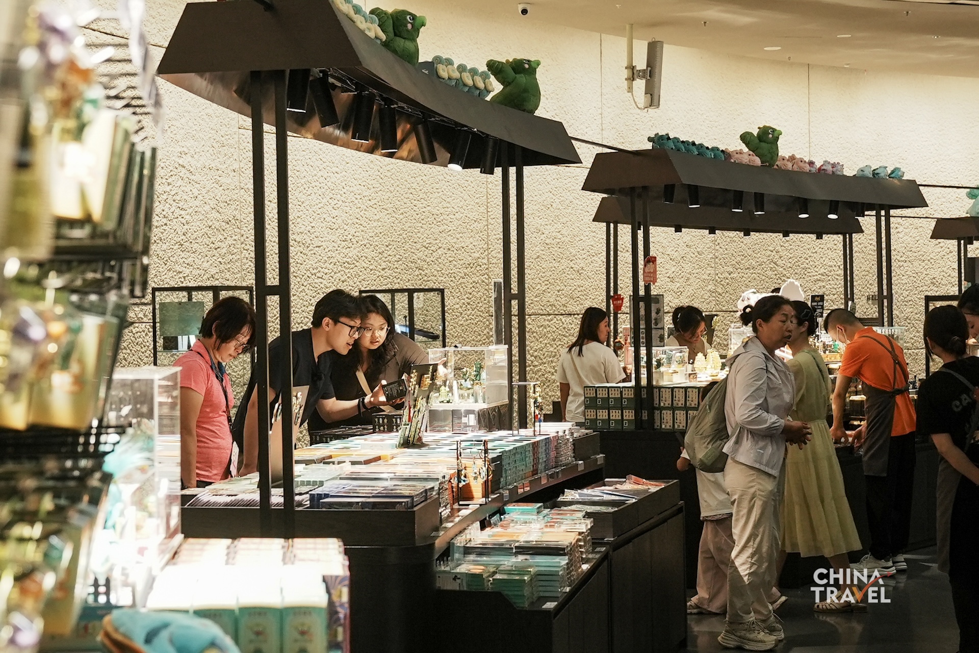 Cultural and creative products inspired by Sanxingdui artifacts bring the museum's iconic bronze figures and masks into everyday life. /CGTN