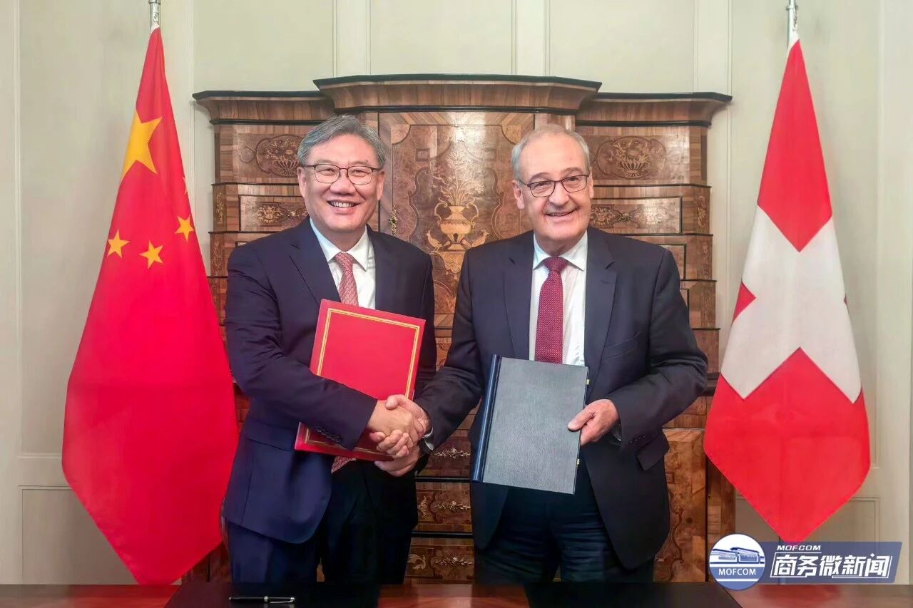 Chinese Commerce Minister Wang Wentao shakes hands with President of the Swiss Confederation Guy Parmelin, Bern, Switzerland, August 20, 2026. /China's Ministry of Commerce

