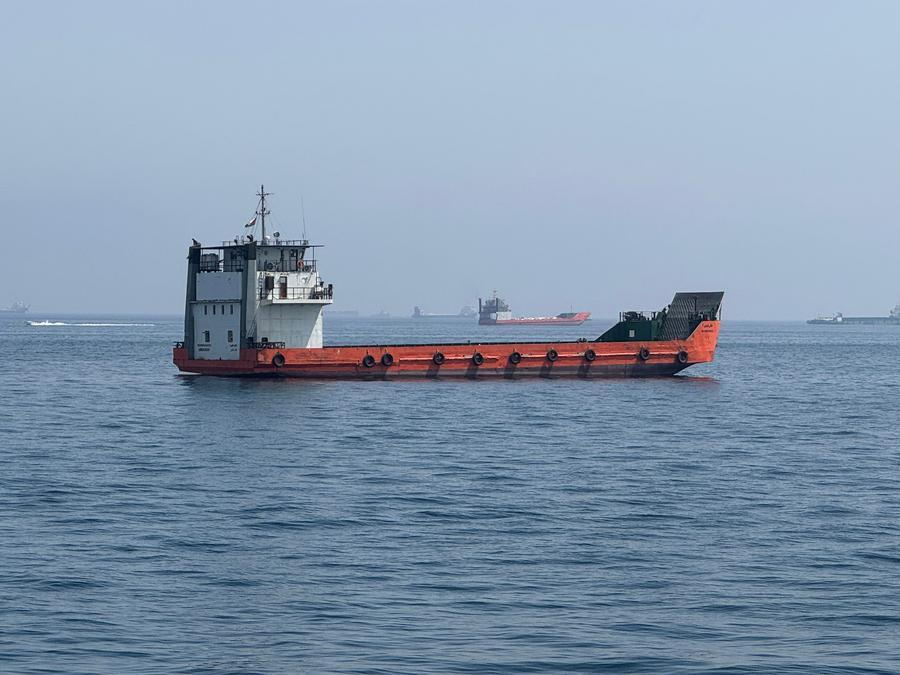 Merchant vessels stranded in the waters of the Strait of Hormuz, near Khasab, a small town in northern Oman, May 29, 2026. /Xinhua