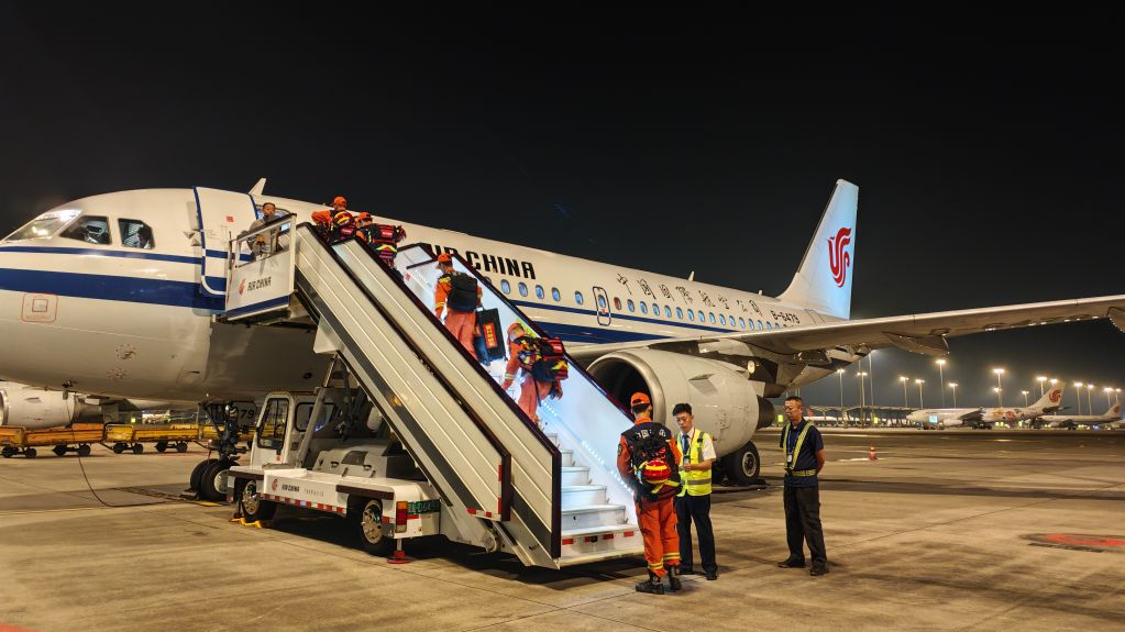 Rescuers with rescue and relief supplies board a plane at Chengdu Shuangliu International Airport in Chengdu, southwest China's Sichuan Province, August 27, 2026. /Xinhua