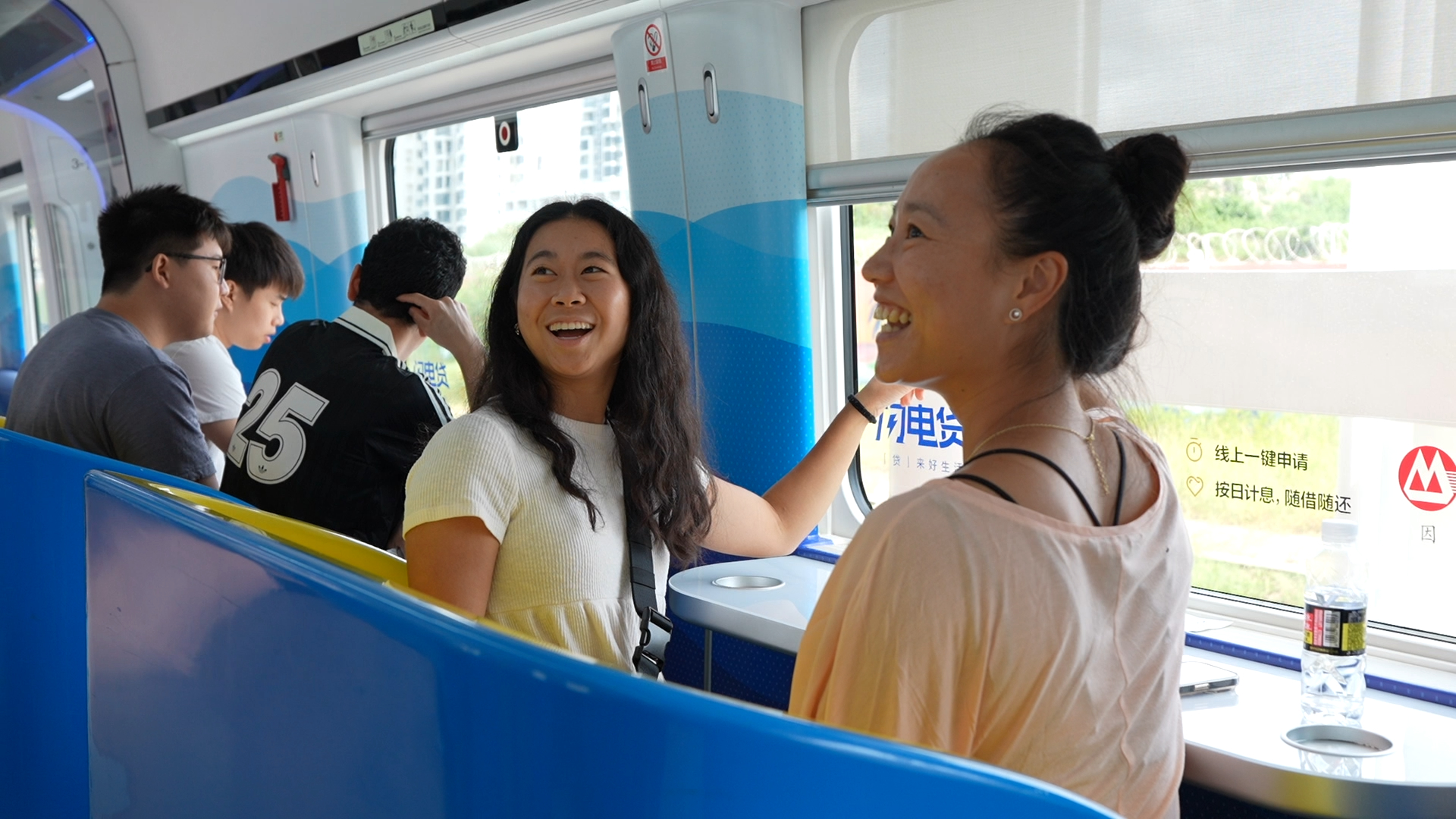 Young US tech representatives on a high‑speed rail in Sanya, Hainan Province, south China, July 30, 2026. 