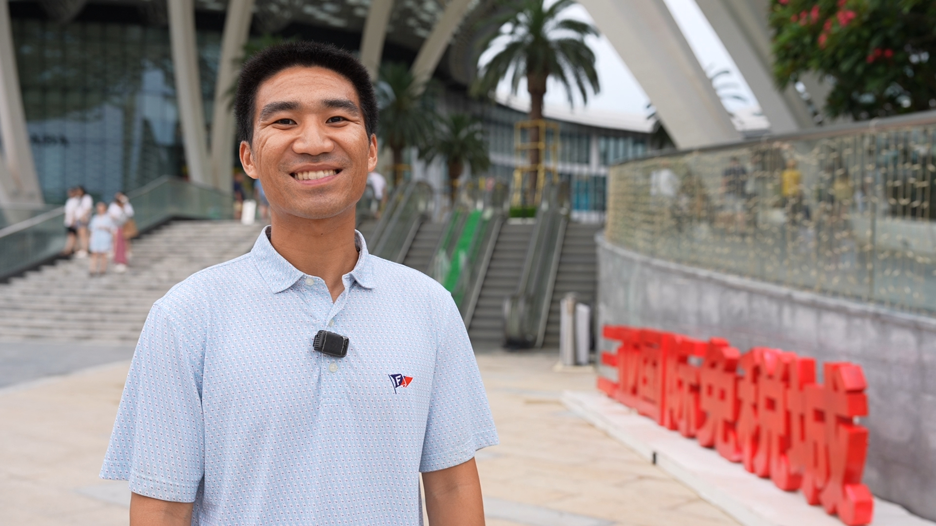 Allan Lei, a fin‑tech professional from California, visits the Sanya International Duty‑Free Shopping Complex, July 31, 2026. 