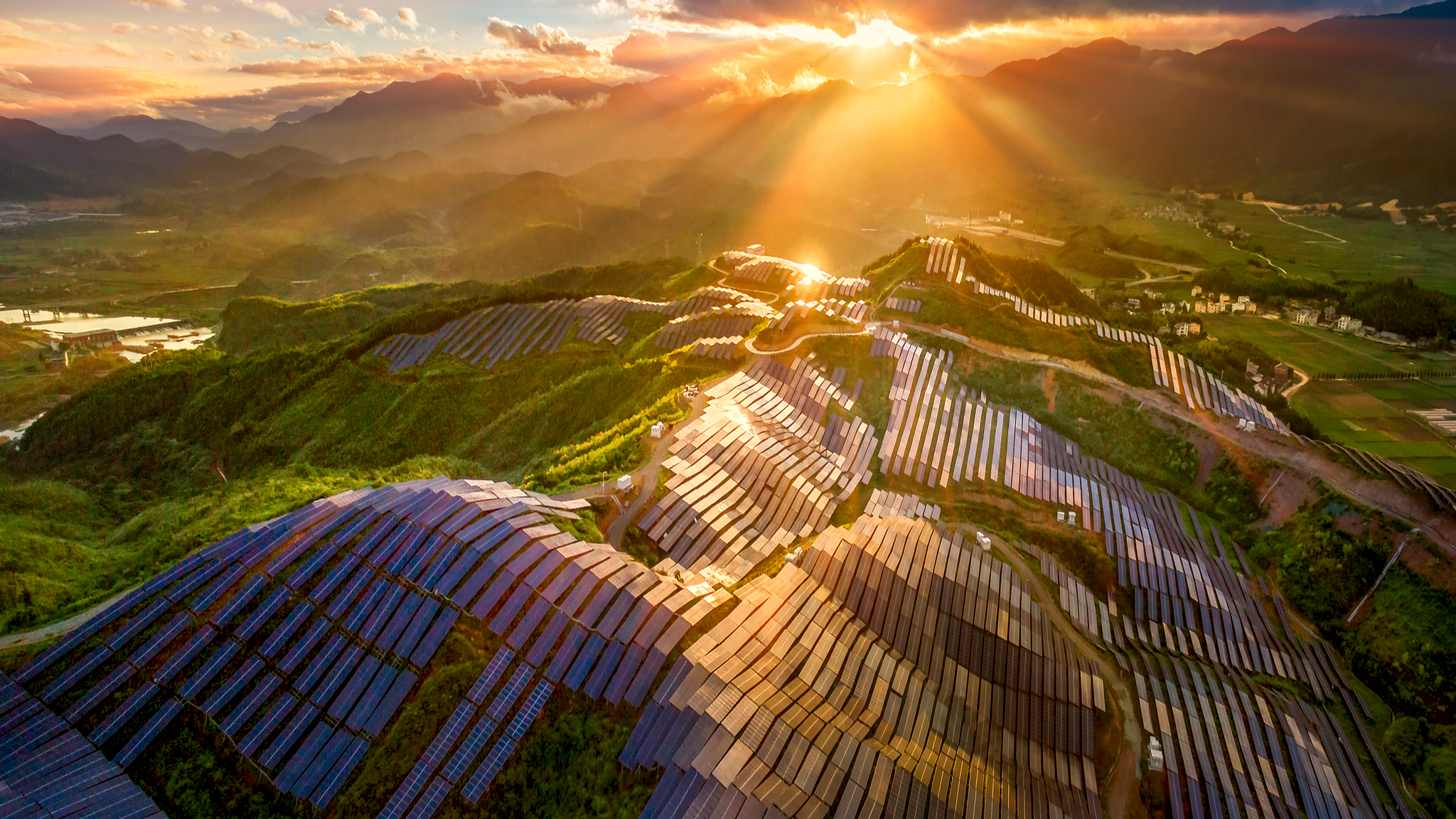 The photovoltaic solar panels gleam golden in the sunlight in Songxi, Fujian Province, southeast China, April 13, 2021. /CFP