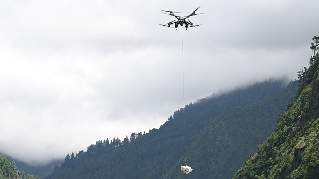 A drone delivers supplies at Gyirong Port in Gyirong, southwest China's Xizang Autonomous Region, August 28, 2026. /VCG