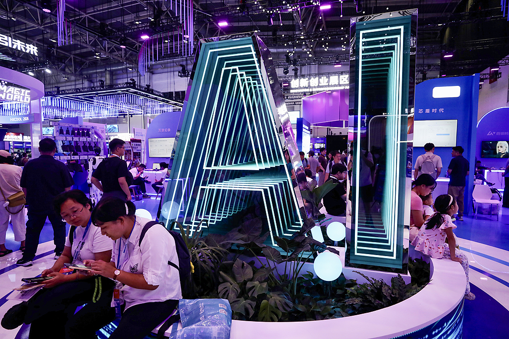 An AI logo is displayed at the exhibition of the HICOOL 2026 Global Entrepreneur Summit, a major platform showcasing global innovation and startup projects, Beijing, August 27, 2026. /VCG