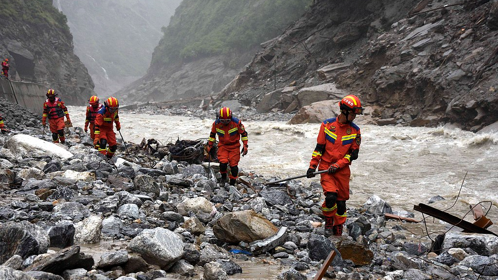 Live: Rescuers push deeper into mudslide-hit area at China-Nepal border