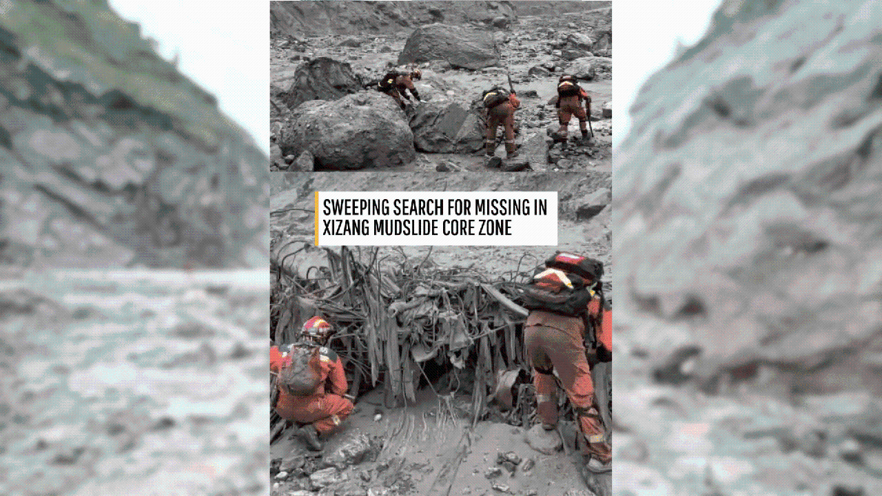 Rescuers search for missing people at mudslide core zone
