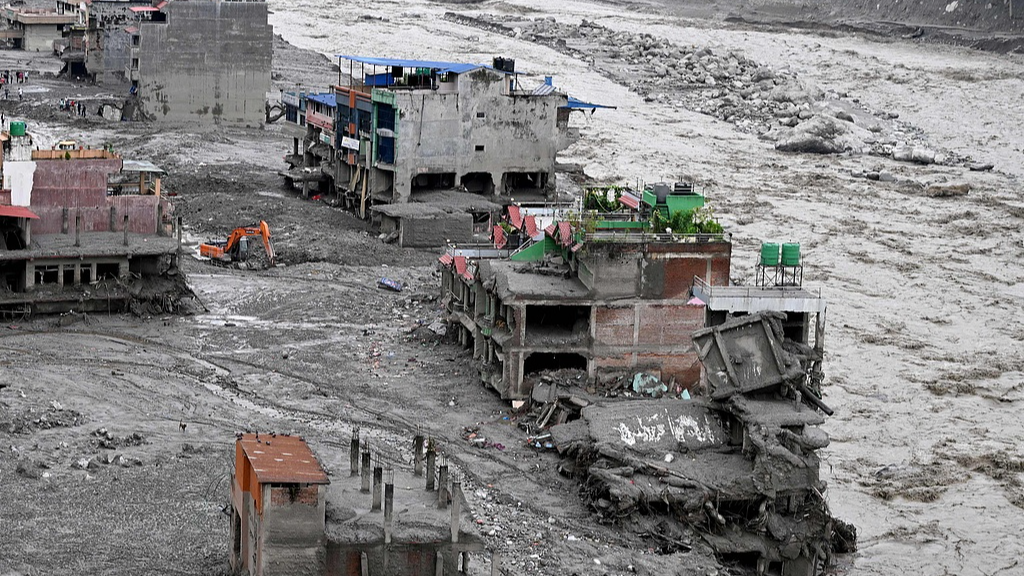 Damaged houses lie deluged in sludge after flash floods at Trishuli Center in Nepal's Nuwakot district on August 31, 2026. /VCG
