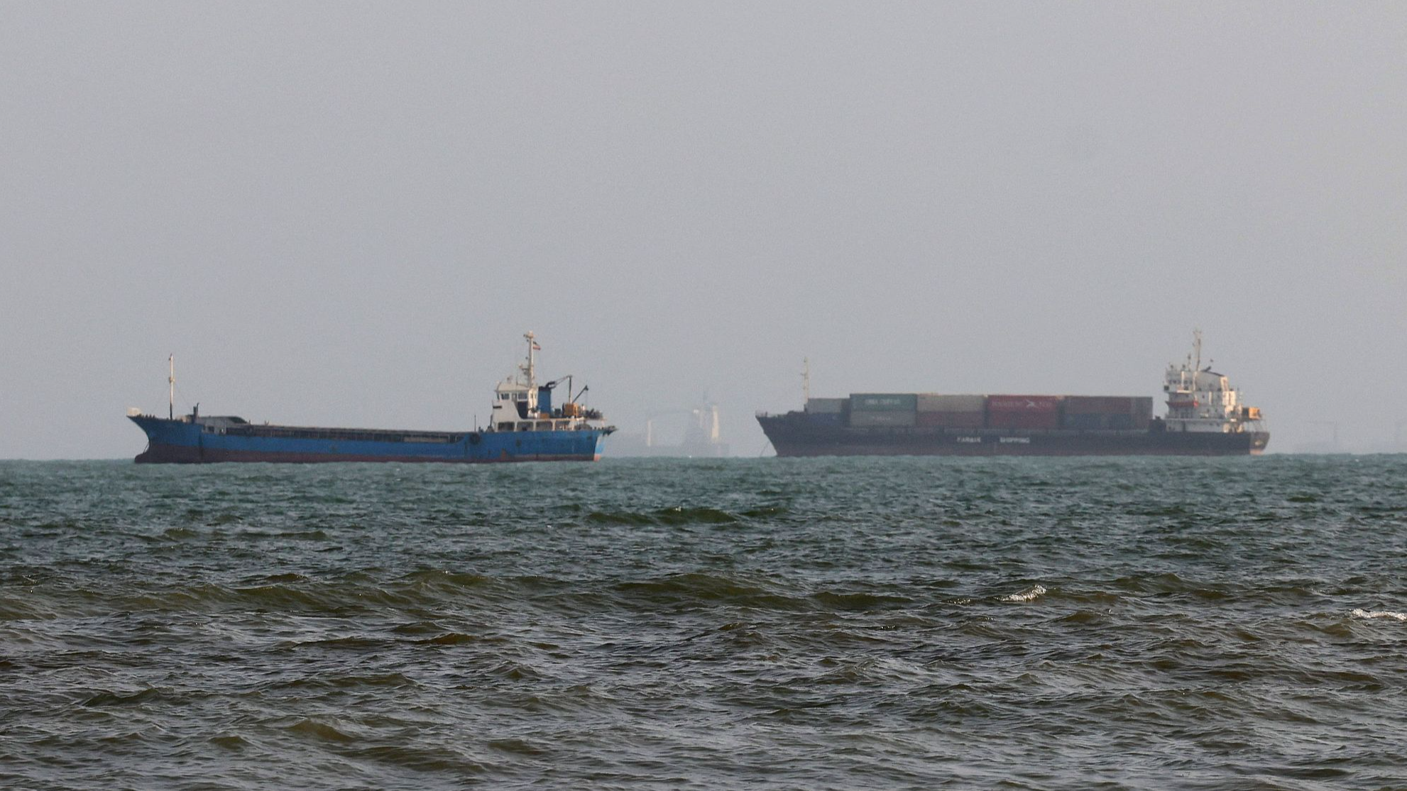 Vessels are seen in the Strait of Hormuz, off the port city of Bandar Abbas in southern Iran on August 10, 2026. /VCG