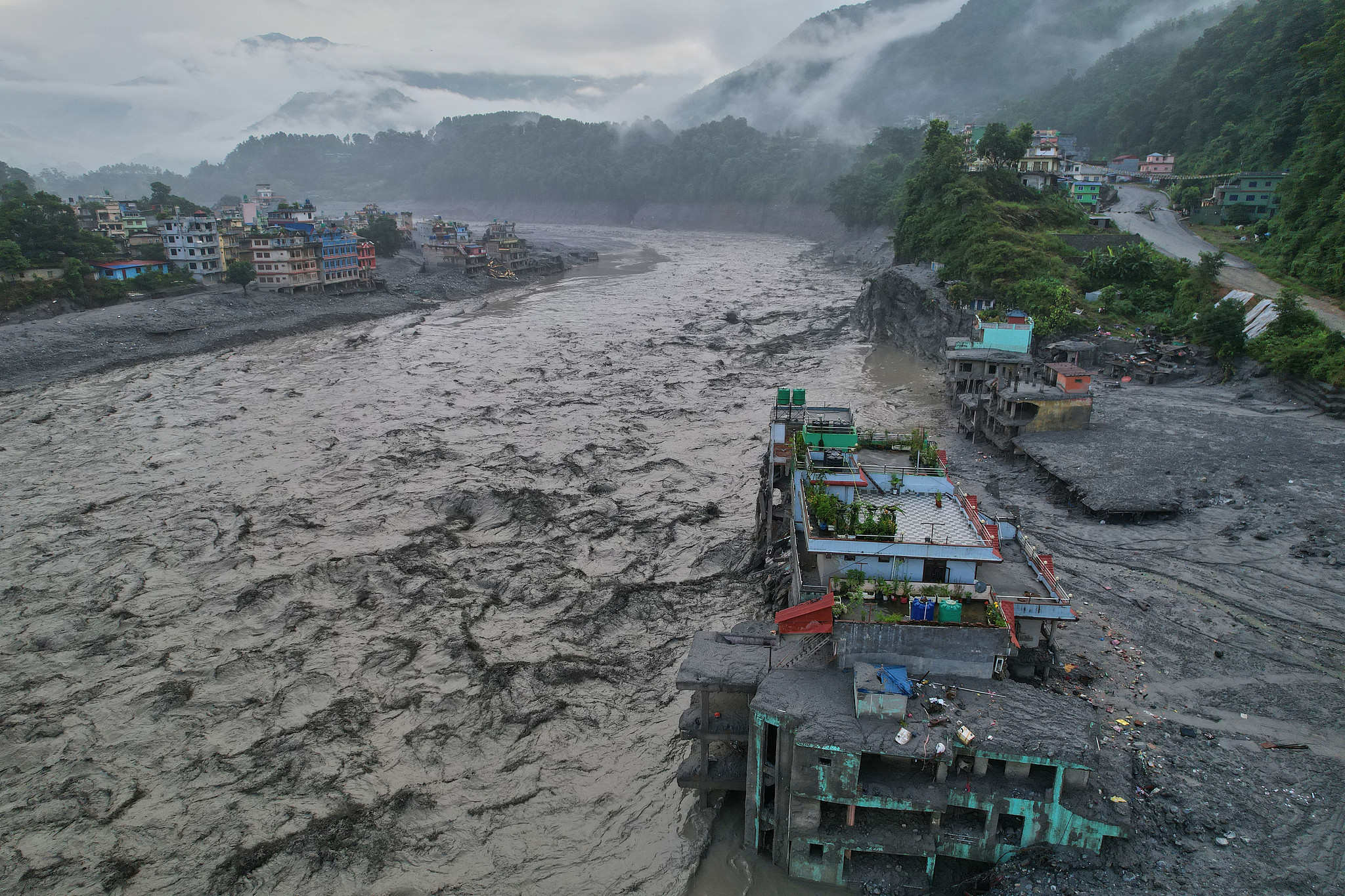 A drone view of the aftermath of the mudslide in Nuwakot district, Nepal, August 30, 2026. /VCG
