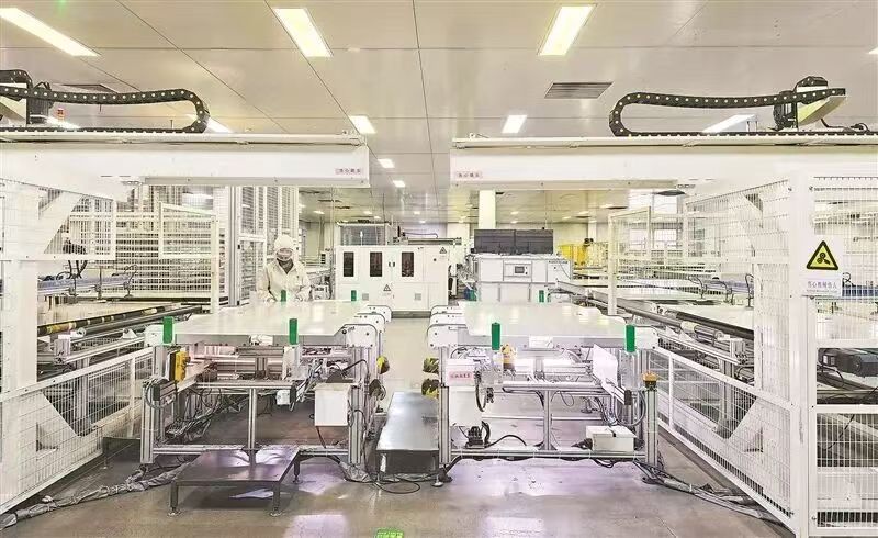 A technician inspects solar modules at the China-Egypt Belt and Road Joint Laboratory on Renewable Energy in Sohag, Egypt. /Embassy of China in Egypt