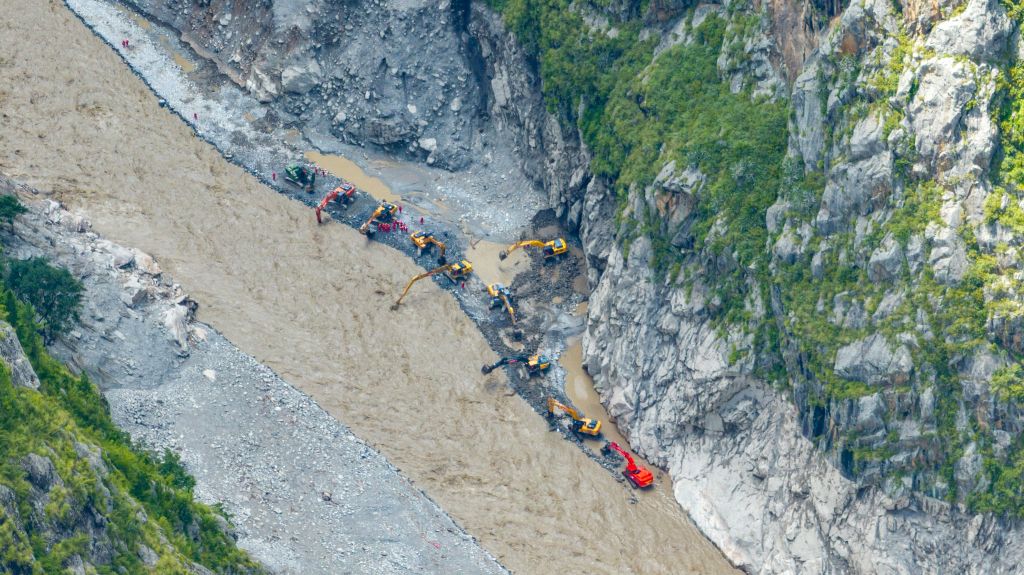 An aerial drone photo shows a road clearing and restoring operation underway in a section of the G216 national highway from Gyirong Town to Gyirong Port in southwest China's Xizang Autonomous Region, August 30, 2026. /Xinhua