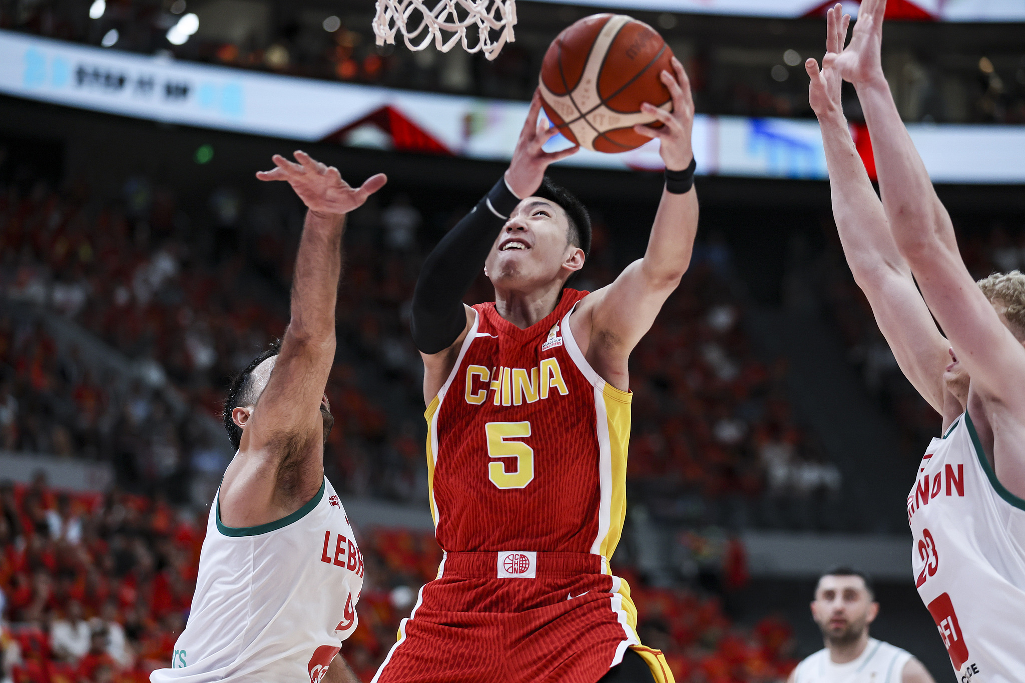 China's Liao Sanning (#5) drives toward the rim in the second-round game of the 2027 FIBA Basketball World Cup Asian Qualifiers against Lebanon in Zhuji, east China's Zhejiang Province, August 31, 2026. /VCG