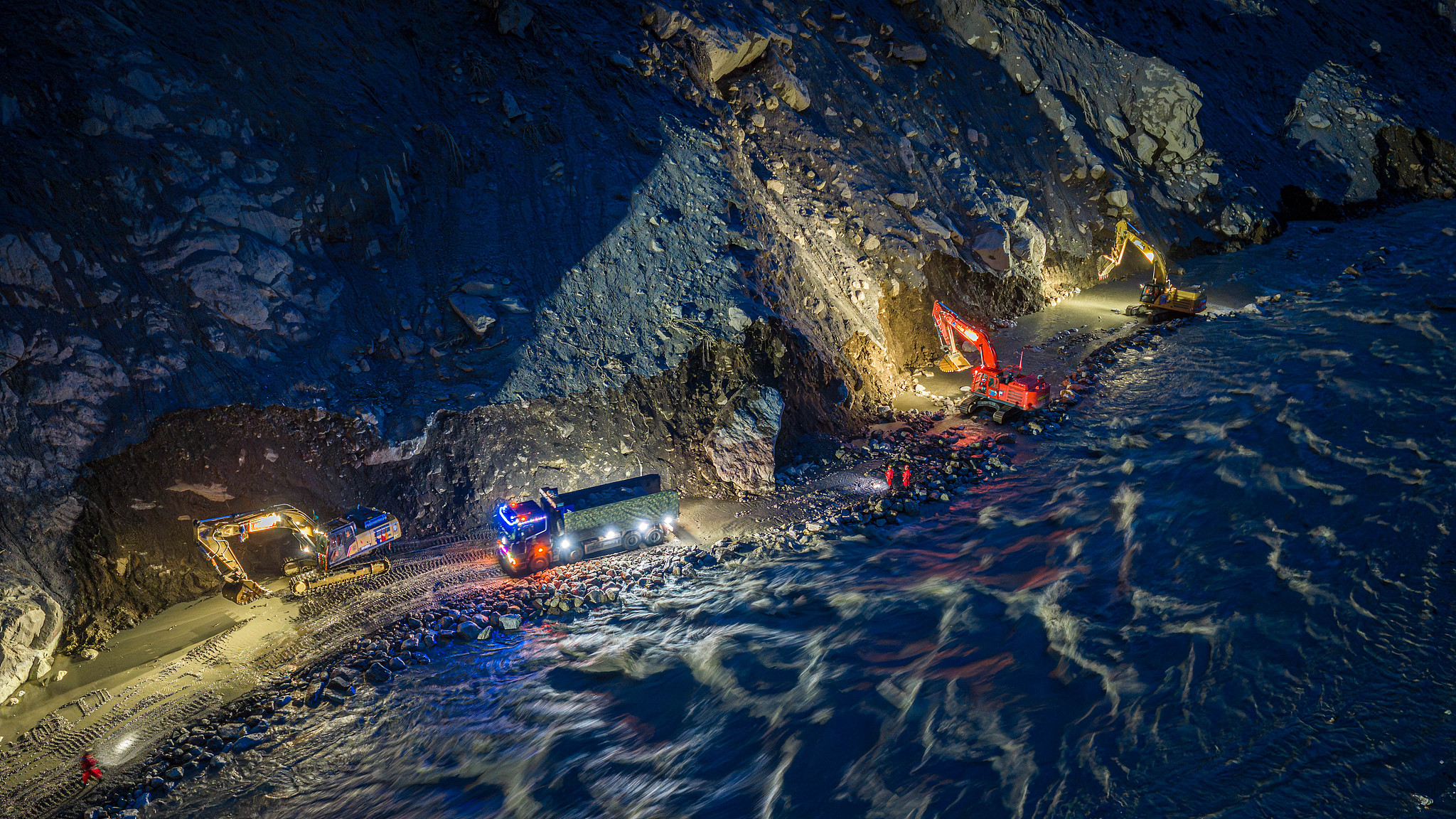 Rescue workers repair a section of National Highway G216 leading to Gyirong Port in southwest China's Xizang Autonomous Region, August 31, 2026.