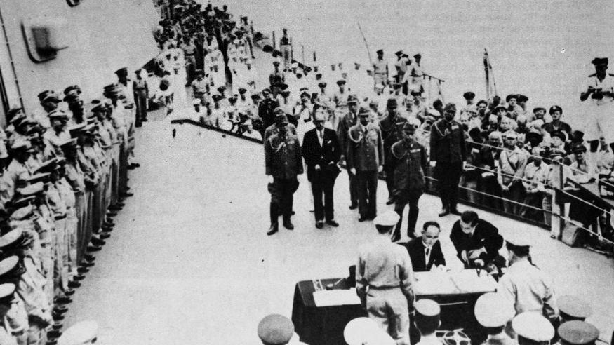 File photo taken on September 2, 1945 shows Japan's surrender ceremony aboard the United States Navy battleship USS Missouri anchored in Tokyo Bay. /Xinhua