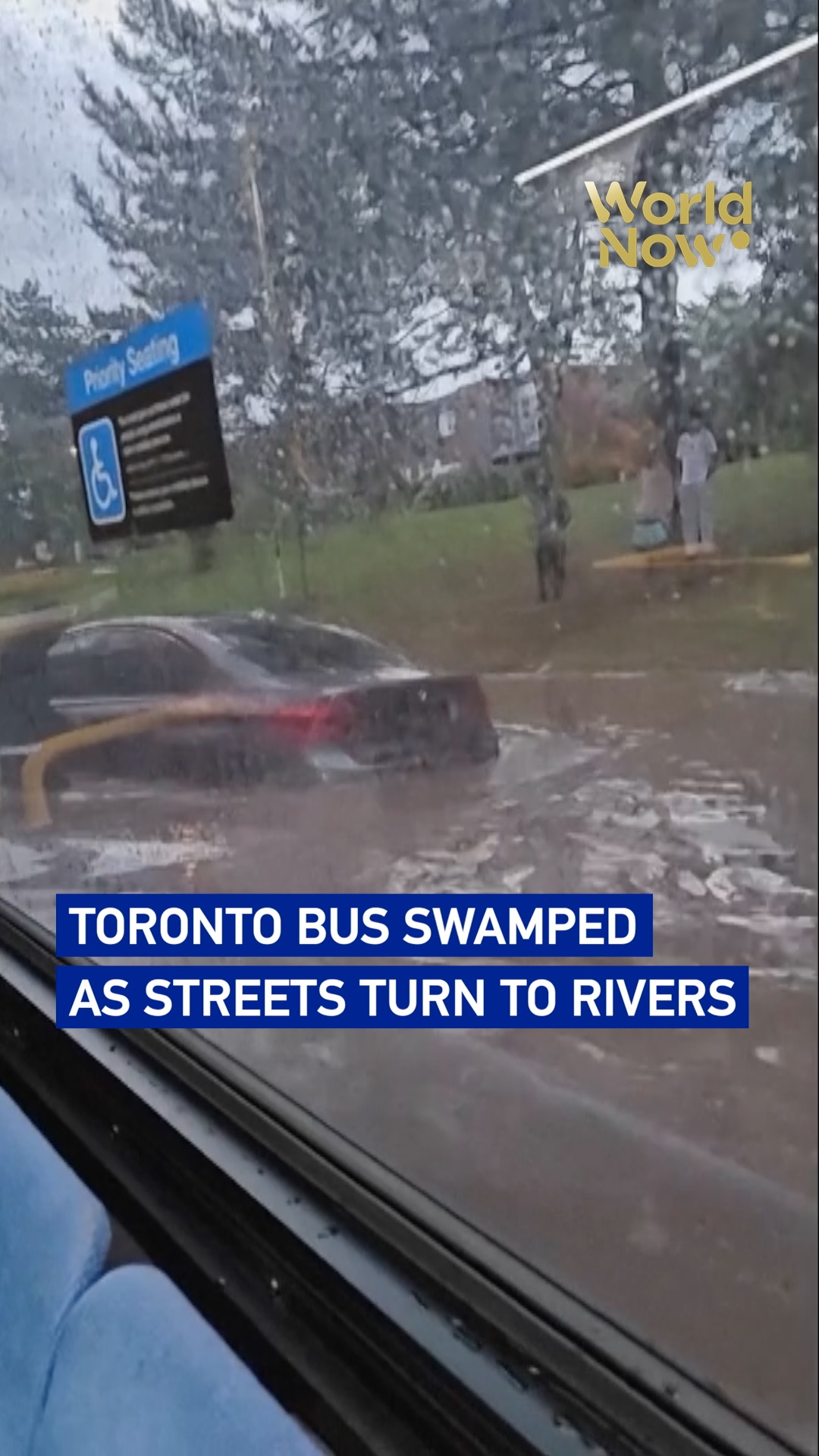Toronto bus swamped as streets turn to rivers