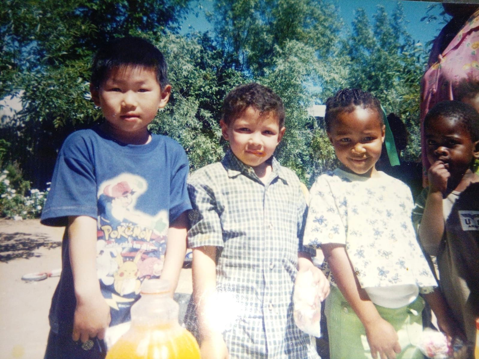 Allan (left) says growing up surrounded by the diverse cultures and races in South Africa helped him adapt and learn the various languages he speaks today. /Allan Pei