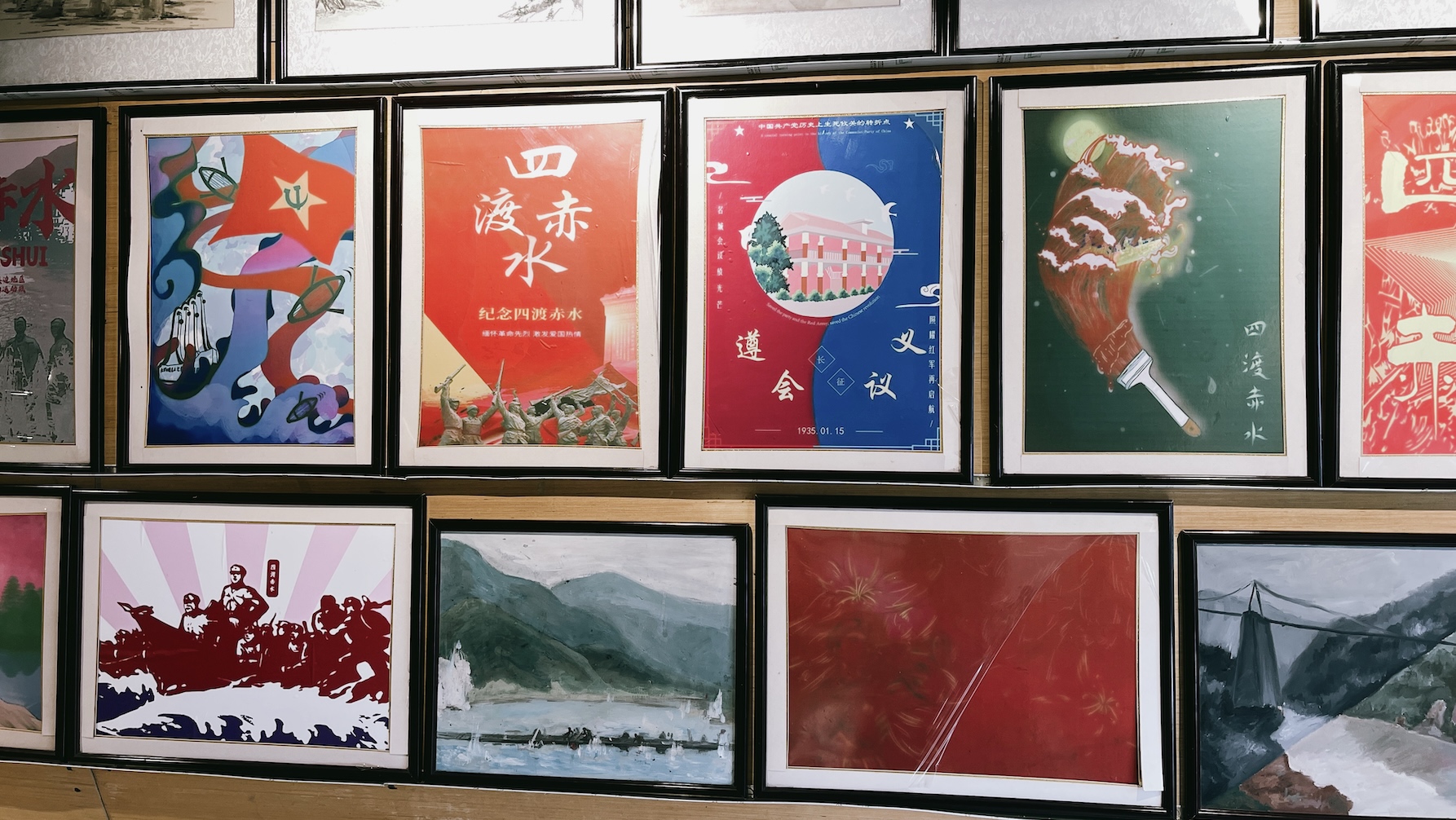 Artworks depicting the Red Army's Four Crossings of the Chishui River on display at the Taiping Ferry Exhibition Hall in Sichuan Province. /CGTN