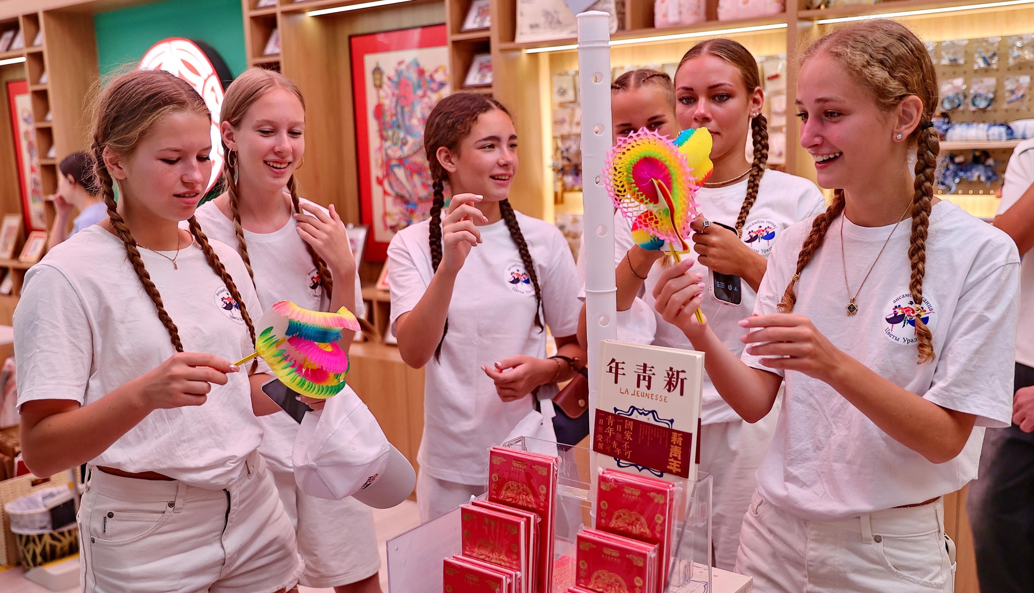 Russian teenagers view cultural and creative products at the Qinhuangdao Museum in north China's Hebei Province on September 3, 2026. /VCG