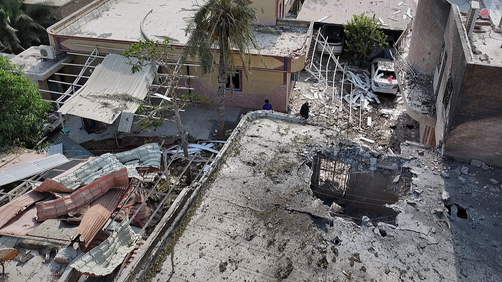An aerial view shows the apparent point of impact on the roof of a building that Iranian media said was hit by a US strike while a wedding celebration was taking place, Kuhestak, southern Iran, September 2, 2026. /VCG