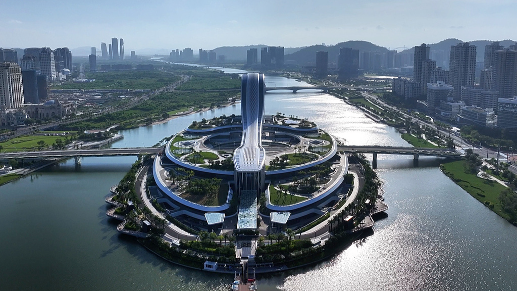 An aerial view of Tianmu Qintai, a waterfront landmark and urban complex in the Hengqin Guangdong-Macao In-Depth Cooperation Zone in Zhuhai, Guangdong Province, China, July 23, 2026. /VCG