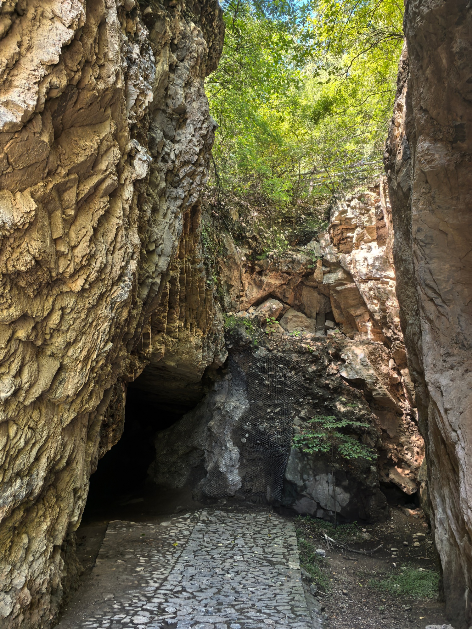 An ancient cave entrance of Peking Man Site at Zhoukoudian is seen in Beijing, August 31, 2026. /CGTN