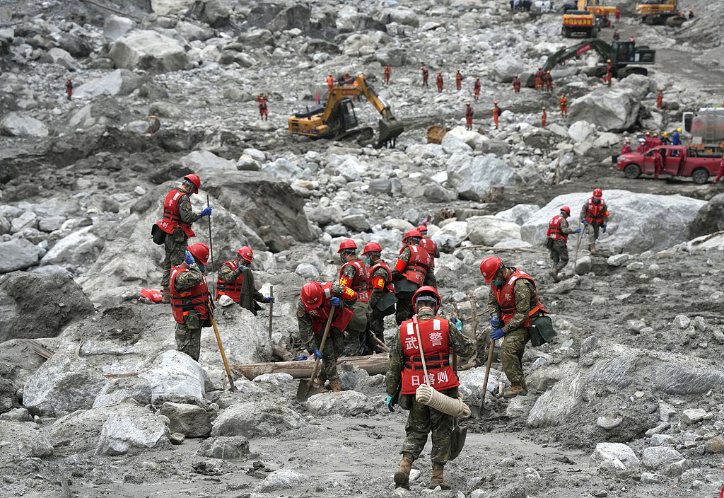 Rescue personnel from various agencies conduct search and rescue operations in the mudslide-hit area of ​Gyirong Port, southwest China's Xizang Autonomous Region, September 2, 2026. /VCG