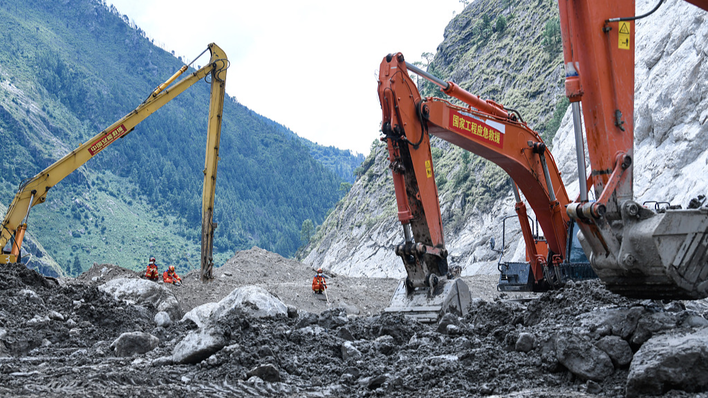 Excavators and other heavy machinery operate in the hardest-hit area of Gyirong Port, southwest China's Xizang Autonomous Region, September 5, 2026. /VCG