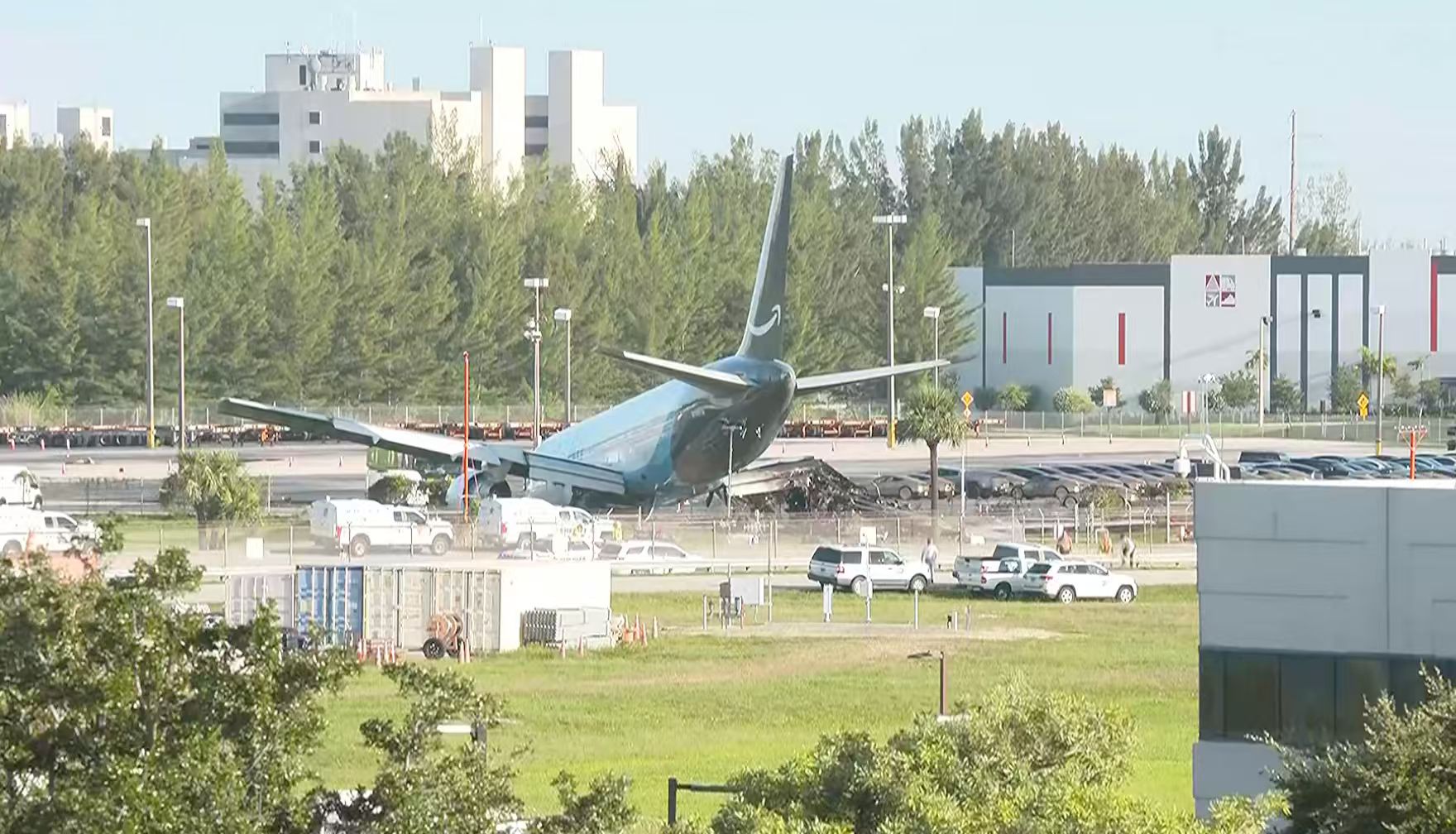 Live: View near Miami airport as cargo plane crash leaves 5 dead