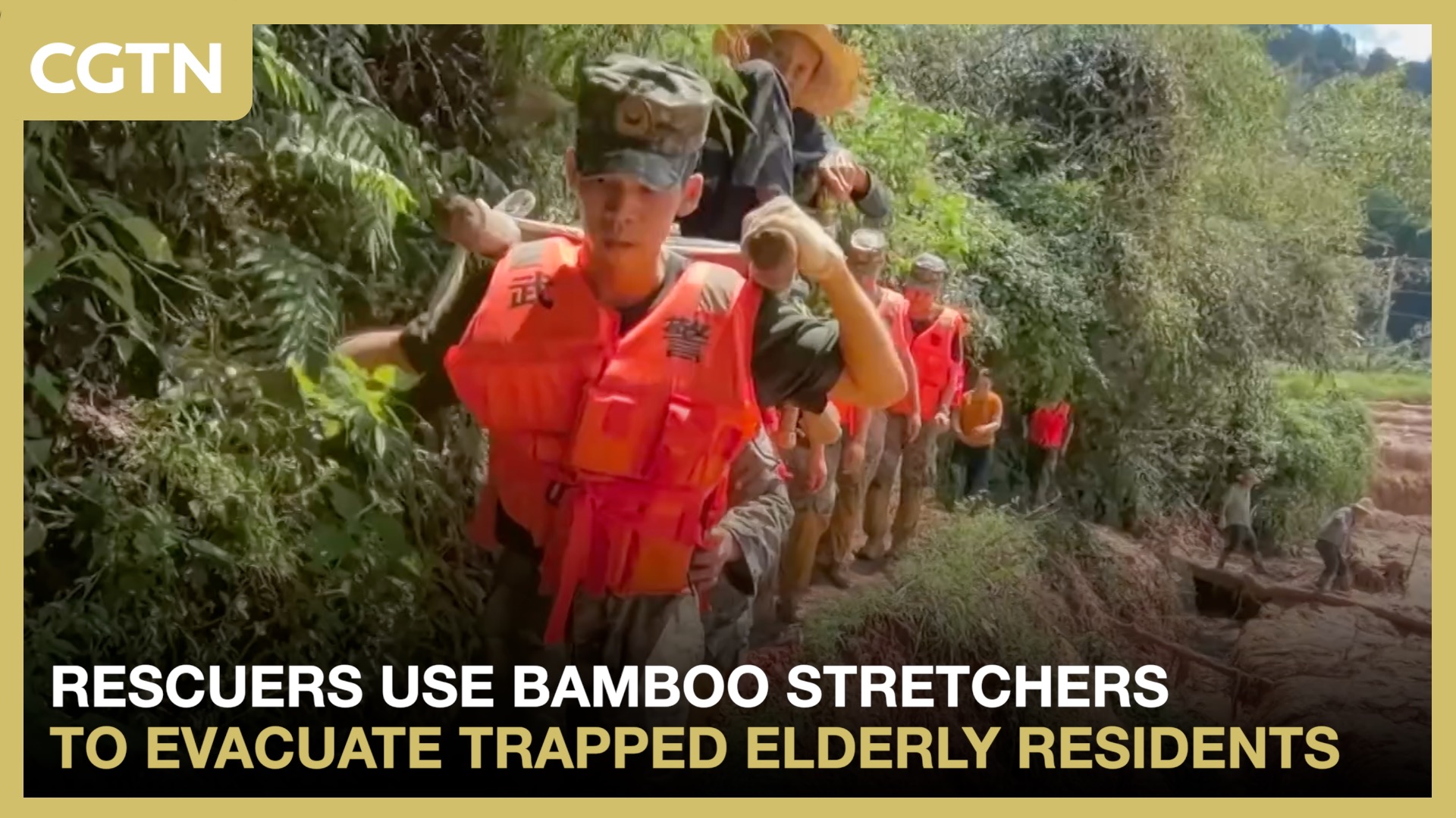 Rescuers use bamboo stretchers to evacuate trapped elderly residents