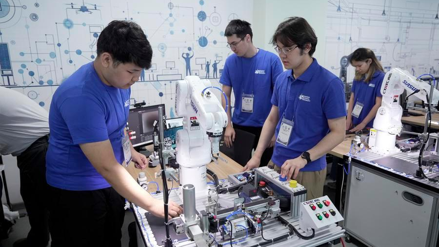 Students operate teaching equipment for the artificial intelligence program at the Luban Workshop at L.N. Gumilyov Eurasian National University in Astana, Kazakhstan, May 22, 2026. /Xinhua