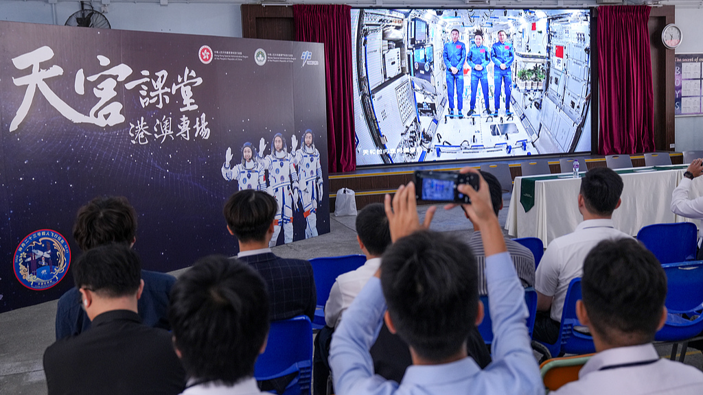Students from China's Hong Kong and Macao special administrative regions (SAR) take the 