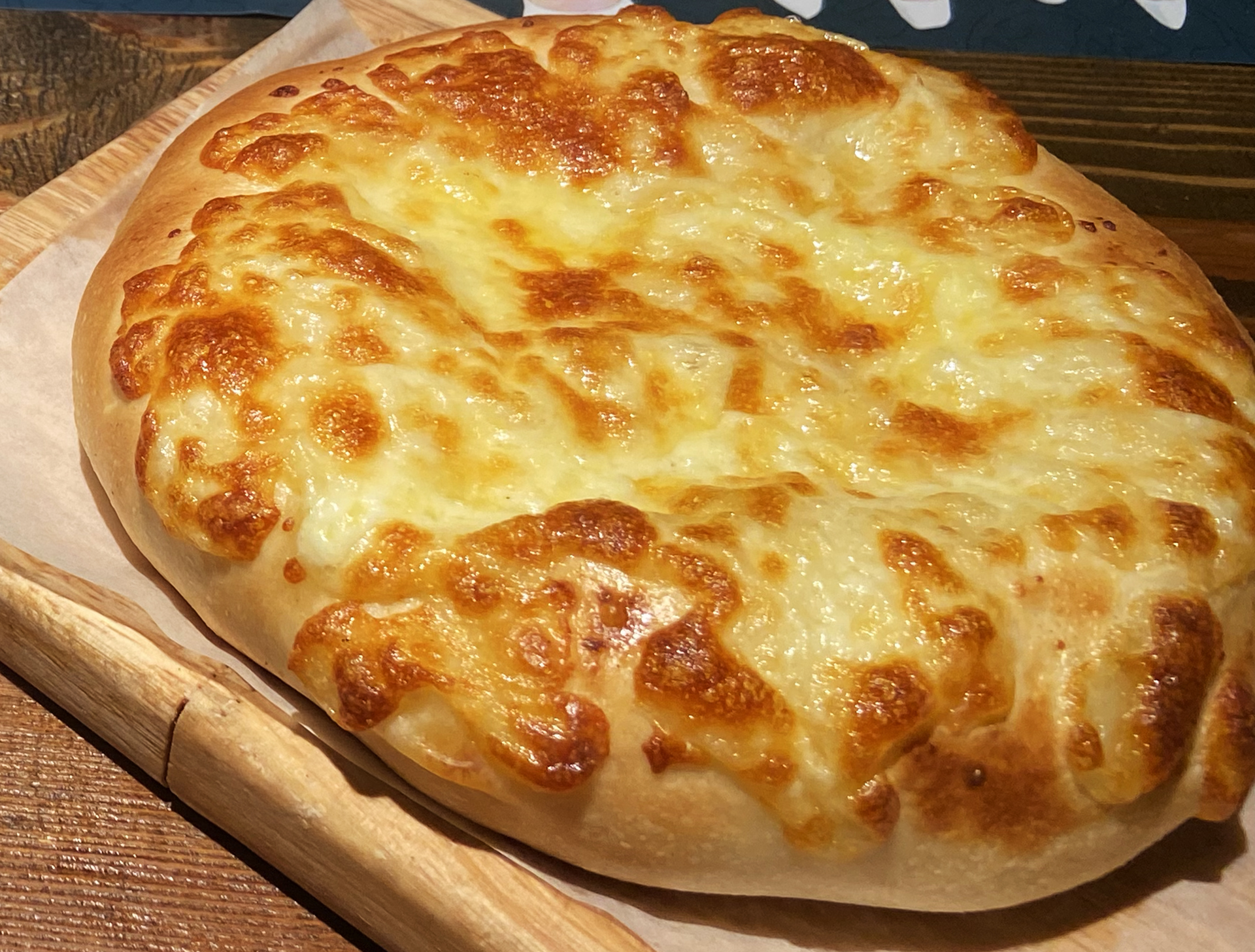 A cheese bun is served at a Russian restaurant in Hulunbuir, Inner Mongolia. /CGTN