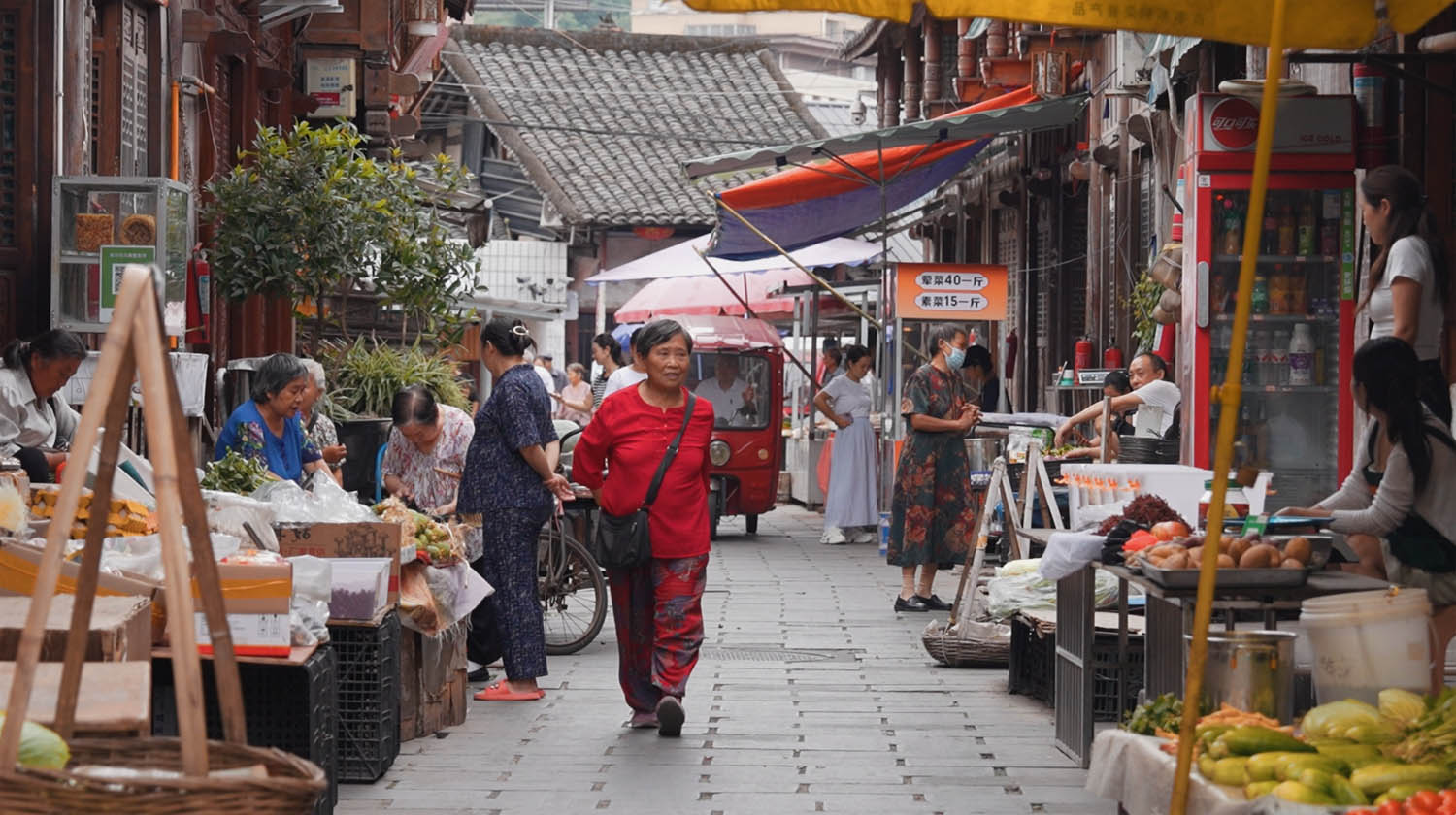 The morning market buzzes with vendors and shoppers along the streets in this Red Army heritage old town in Wangcang, northeastern Sichuan Province, on September 9, 2026. /CGTN