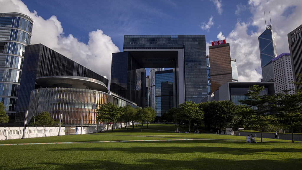 The Legislative Council building (L),  HKSAR Government headquarters (M) and other buildings in Hong Kong, China, May, 26, 2021. /VCG