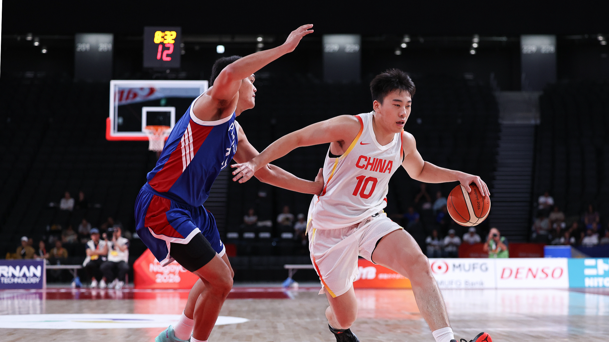 China routs defending champion Philippines to finish top in Group C