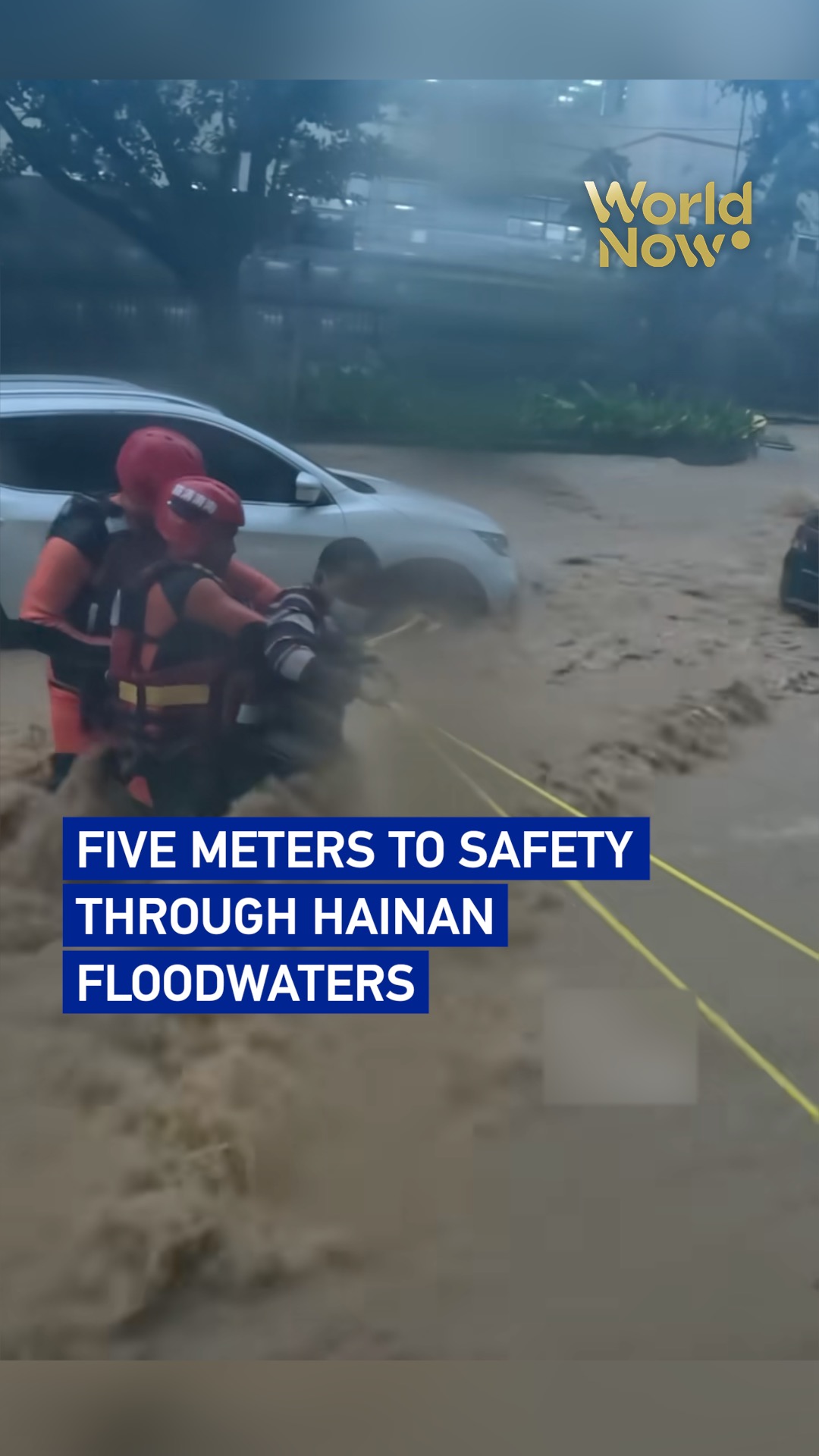 Five meters to safety through Hainan floodwaters