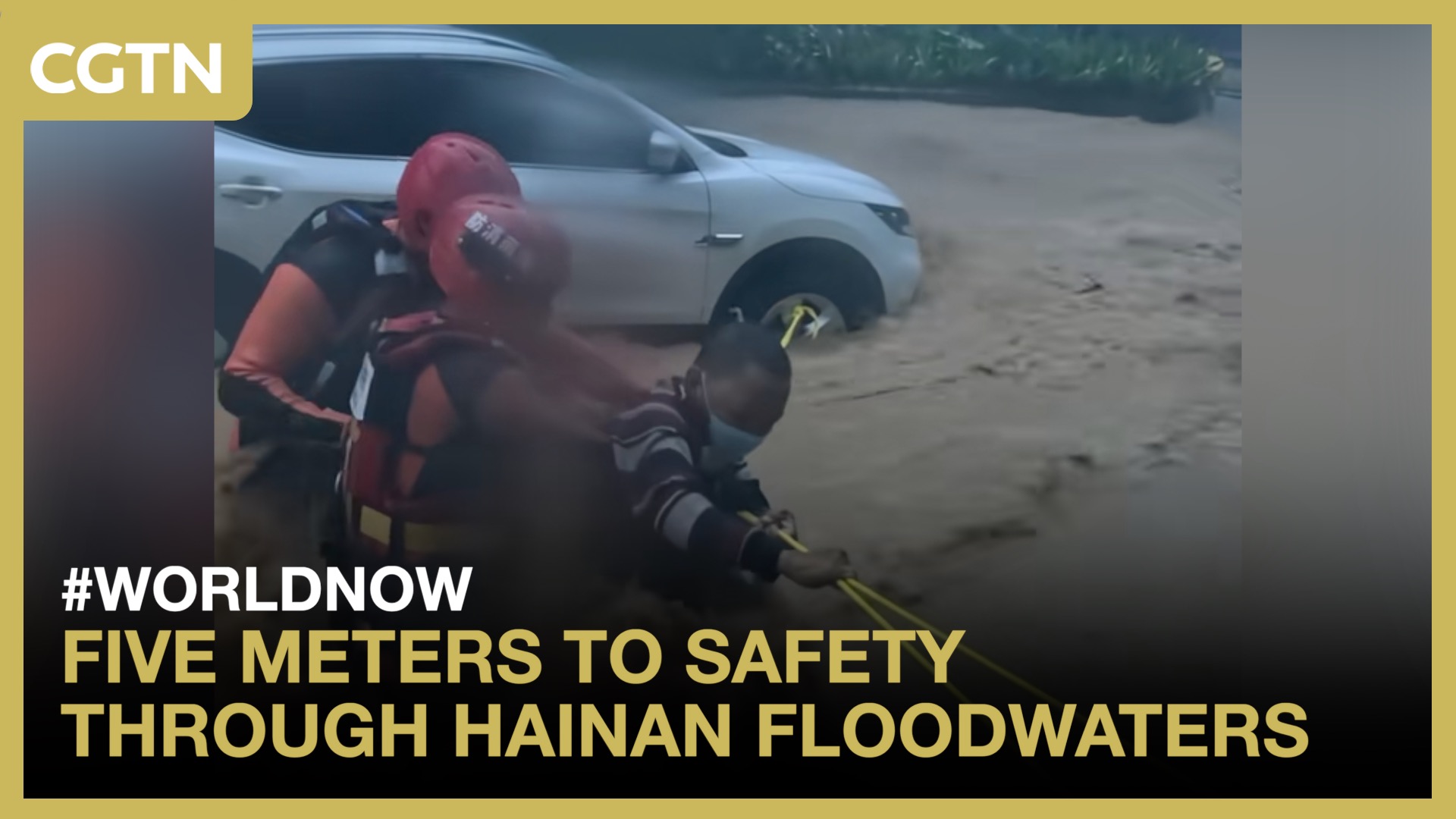 Five meters to safety through Hainan floodwaters