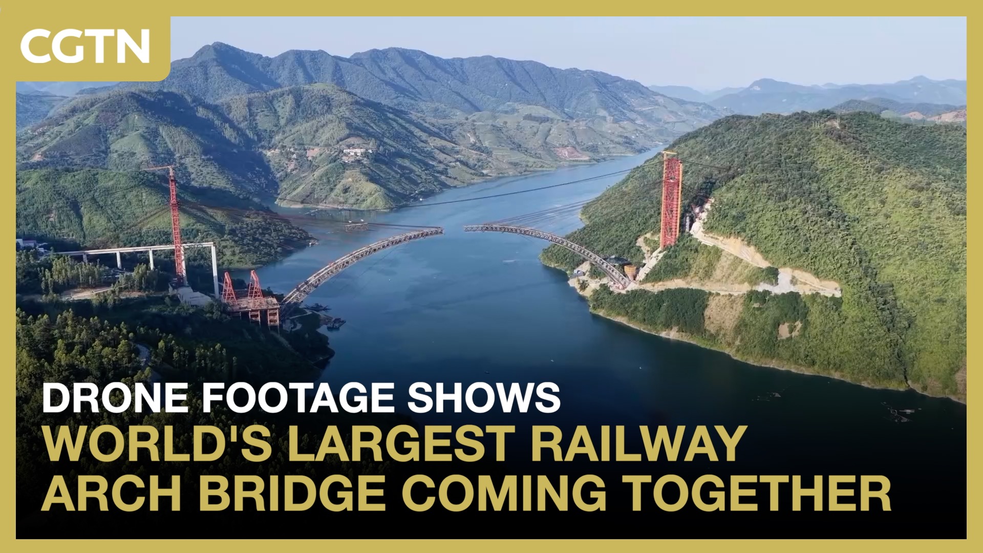 Drone footage shows world's largest railway arch bridge coming together