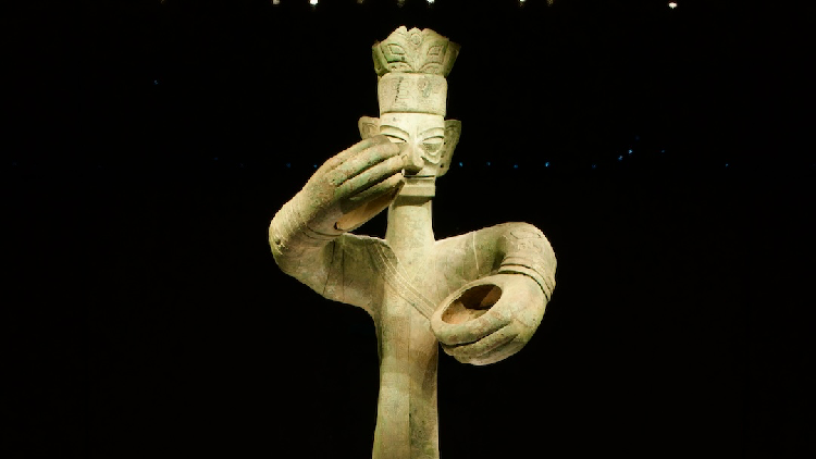 What did the Great Bronze Figure hold?