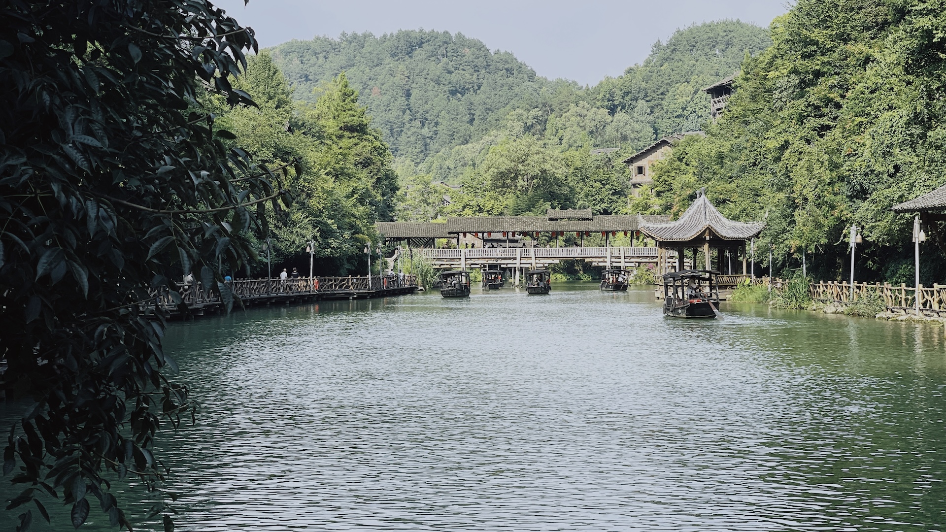 A bridge spans the Wujiang River amid the mountains in Guizhou, China. /CGTN