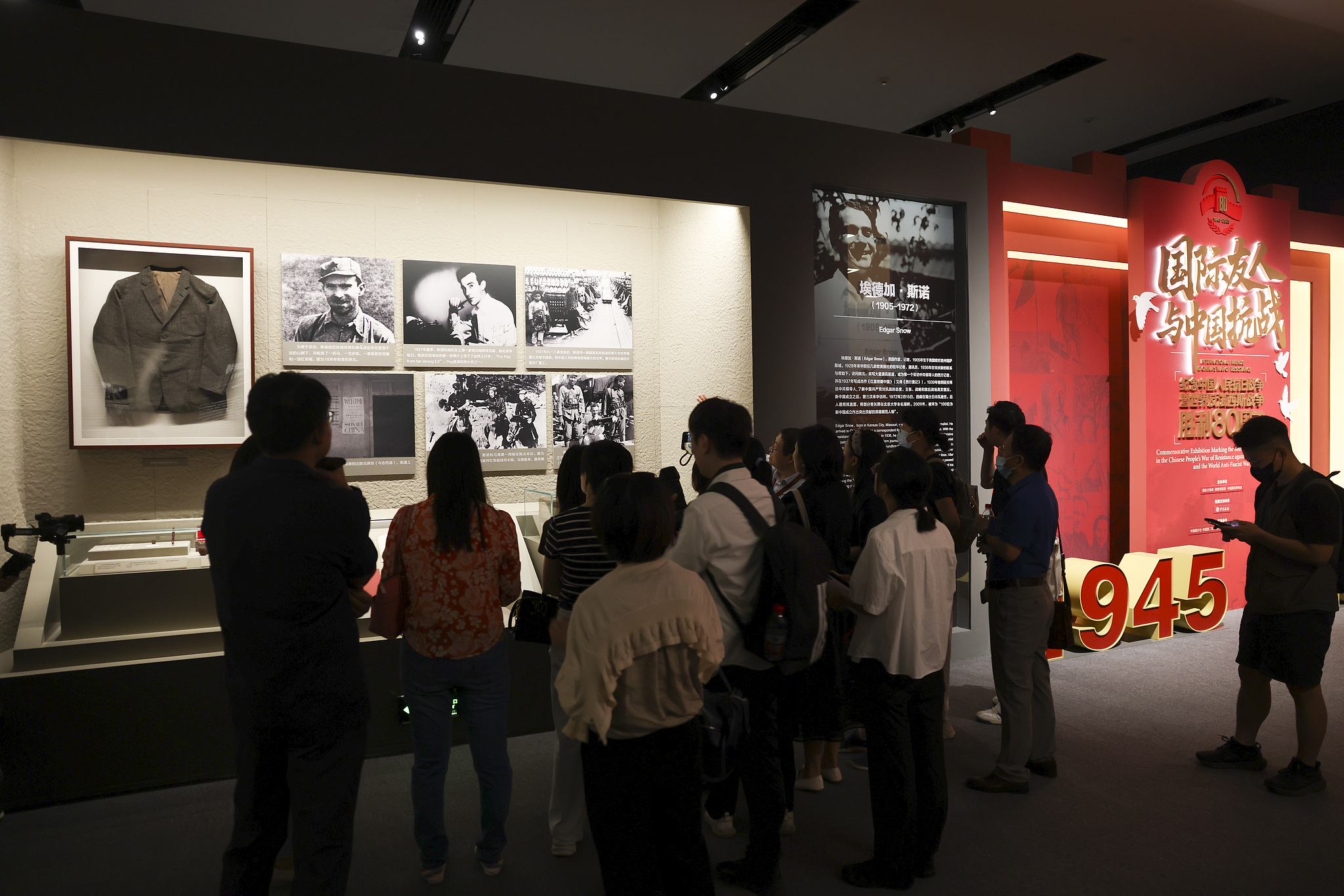 Visitors view historical materials related to Edgar Snow during the special exhibition 