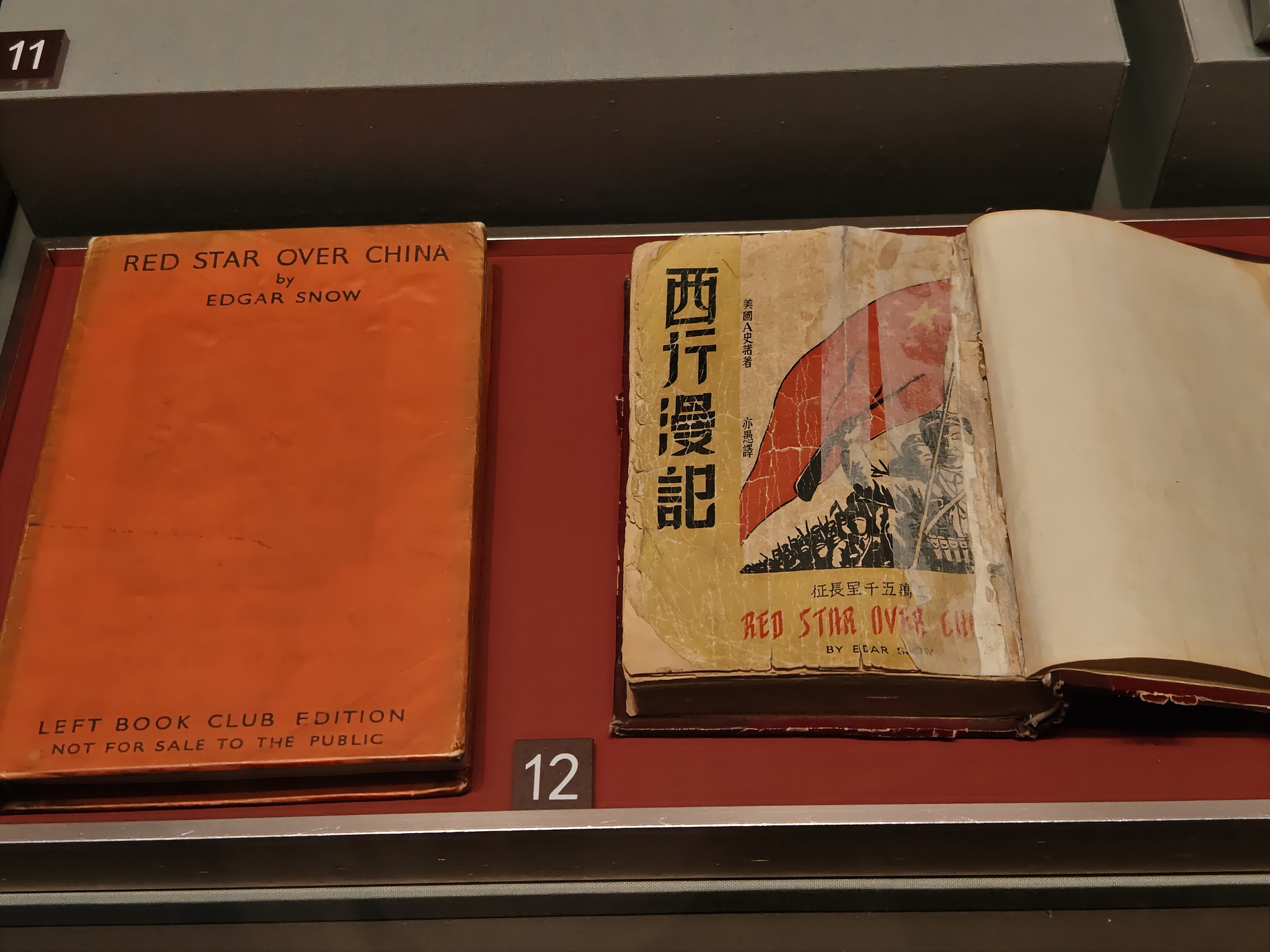 An original edition of Edgar Snow's Red Star Over China and its Chinese edition, on display at the Museum of the Communist Party of China, Beijing, April 9, 2026. /CFP