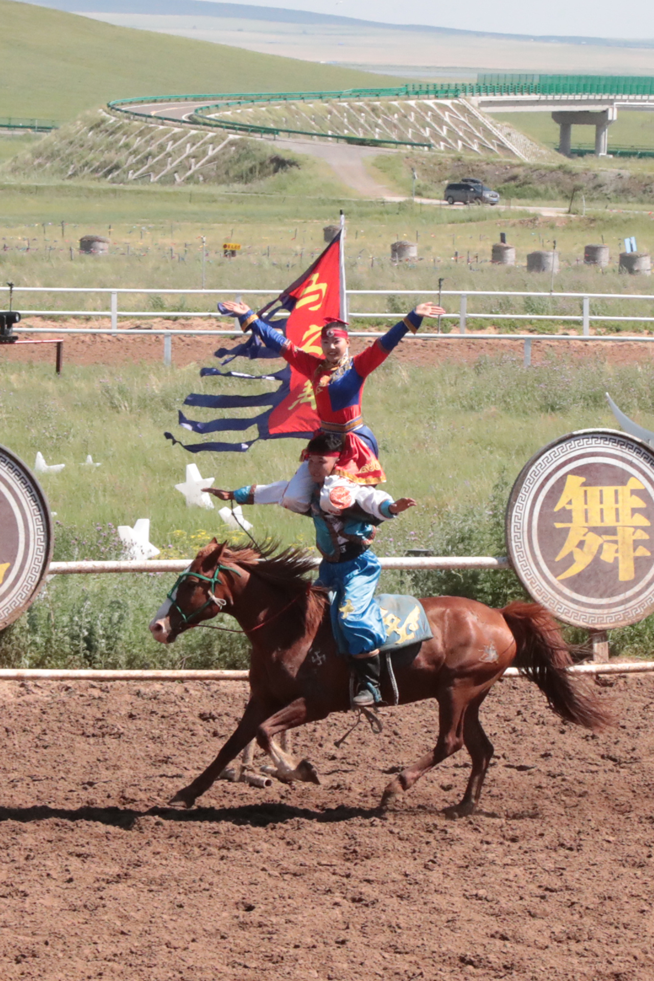 Performers showcase equestrian acrobatics during 